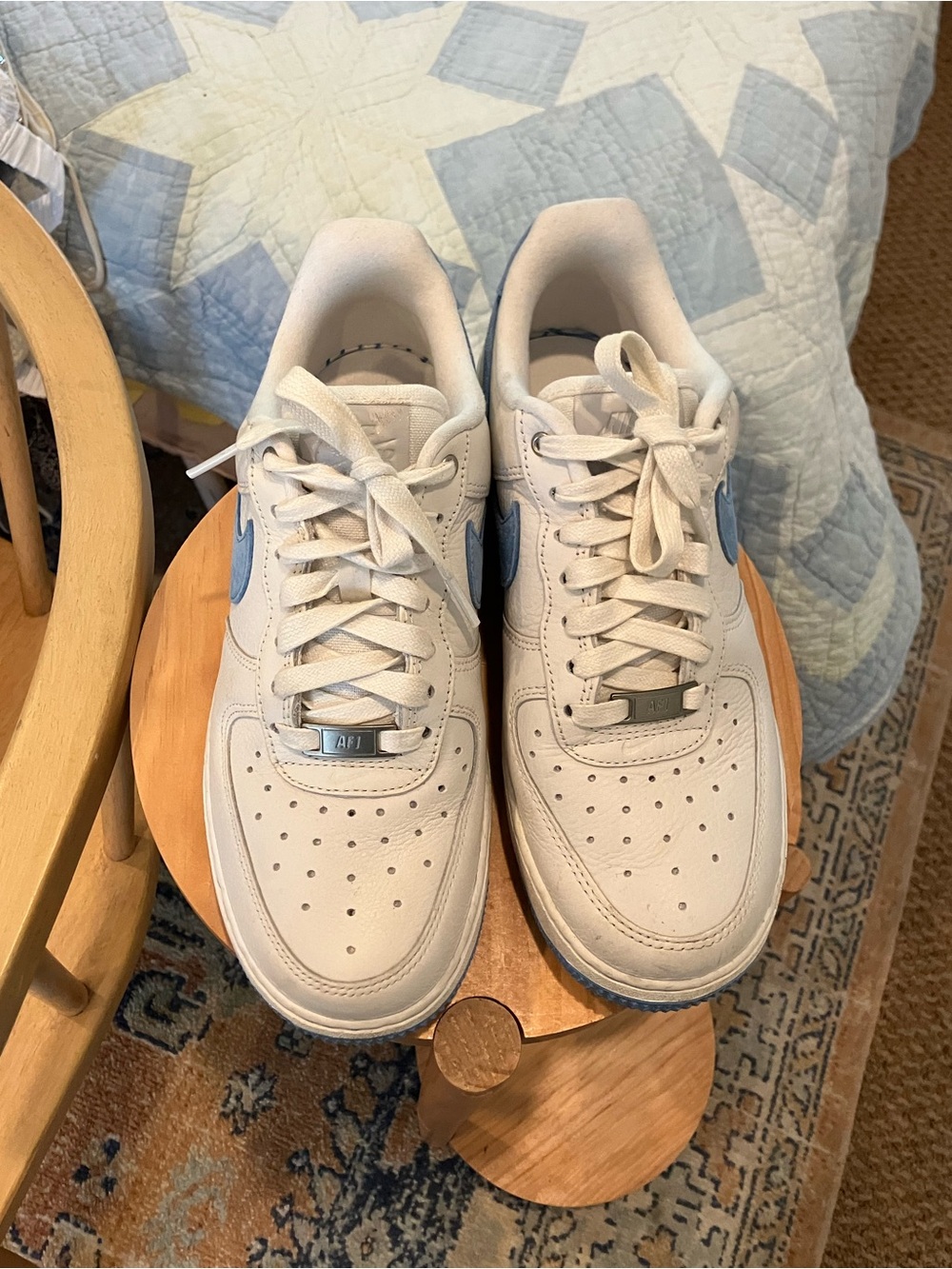 Nike White Sneakers with Light Blue Swoosh Accent